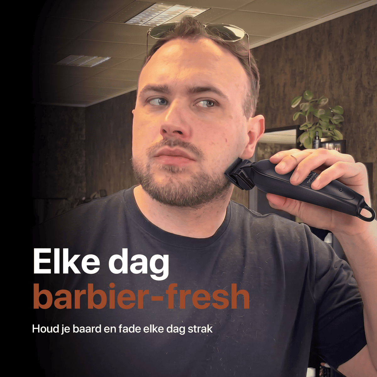 The man trims his beard with the Viking Blade trimmer.