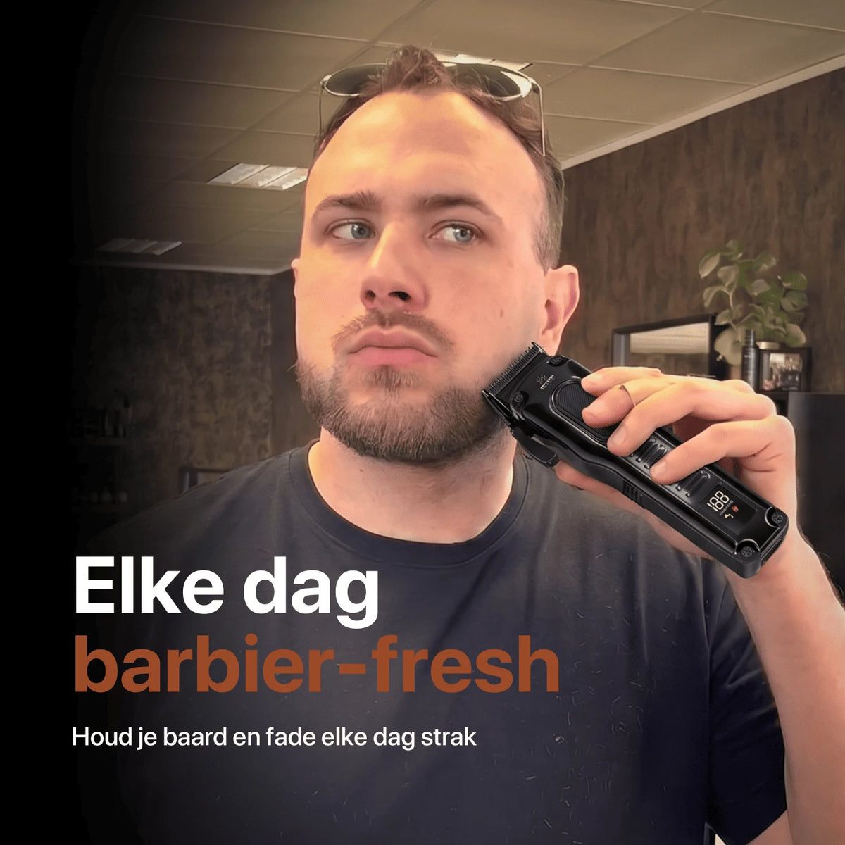 A man trims his beard with the Viking Precision trimmer